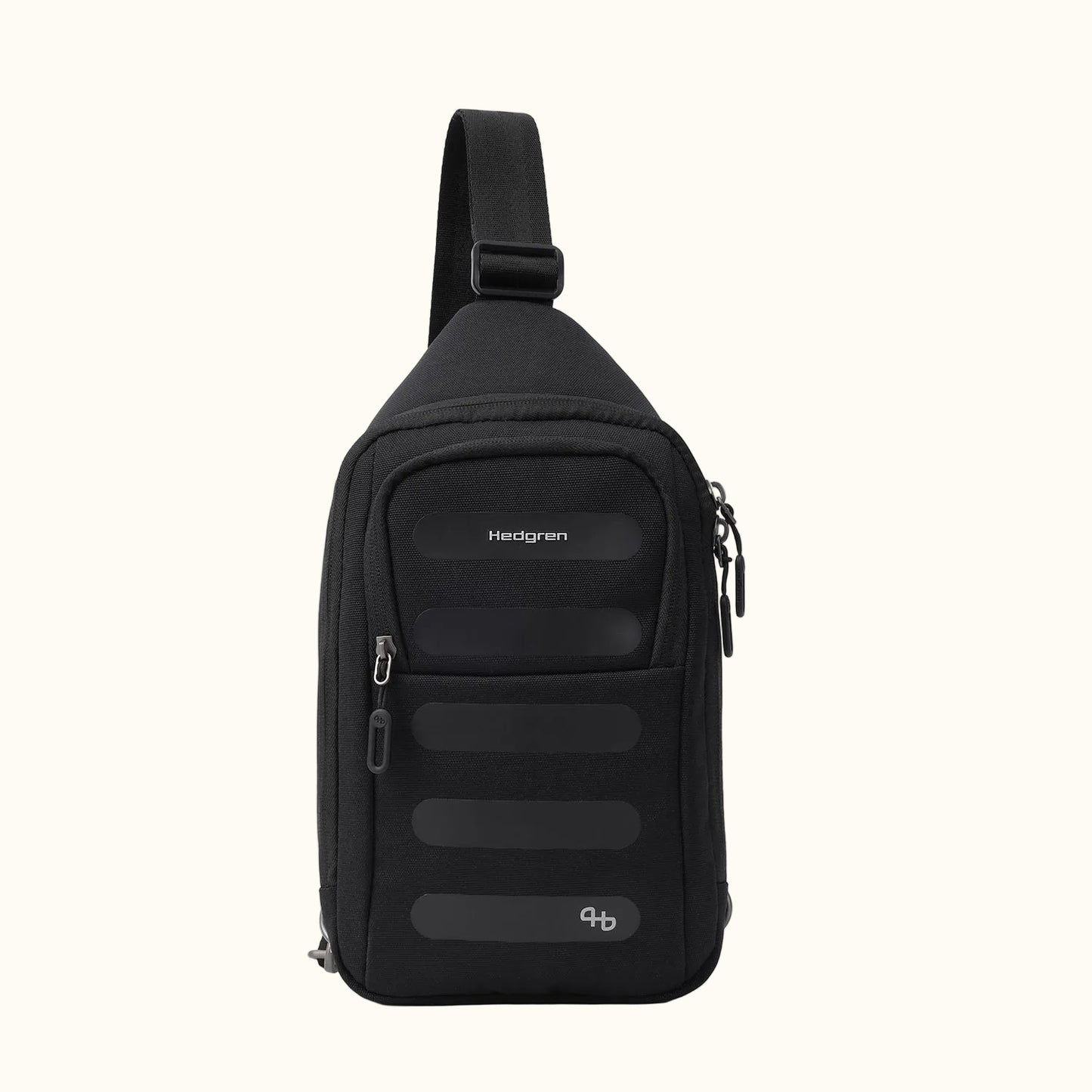Black fabric sling bag by Hedgren, front view, with horizontal front panels, a unique lower symbol, and an adjustable strap.