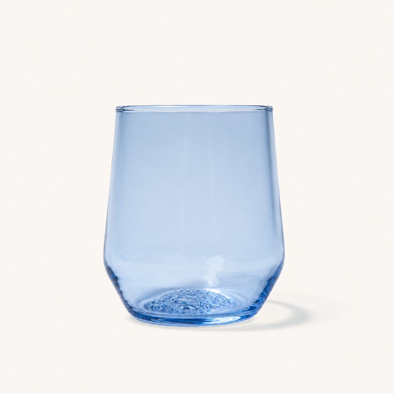 Light blue stemless wine glass with textured circular base, front view, clear glass material