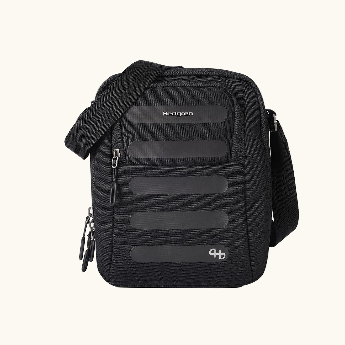 Black fabric sling bag by Hedgren with horizontal dark stripes, a silver qb logo, and an adjustable strap.