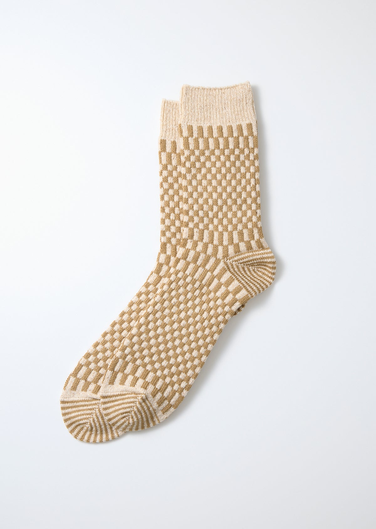 Beige and cream checkerboard pattern socks, knitted with ribbed cuffs and striped heel and toe.