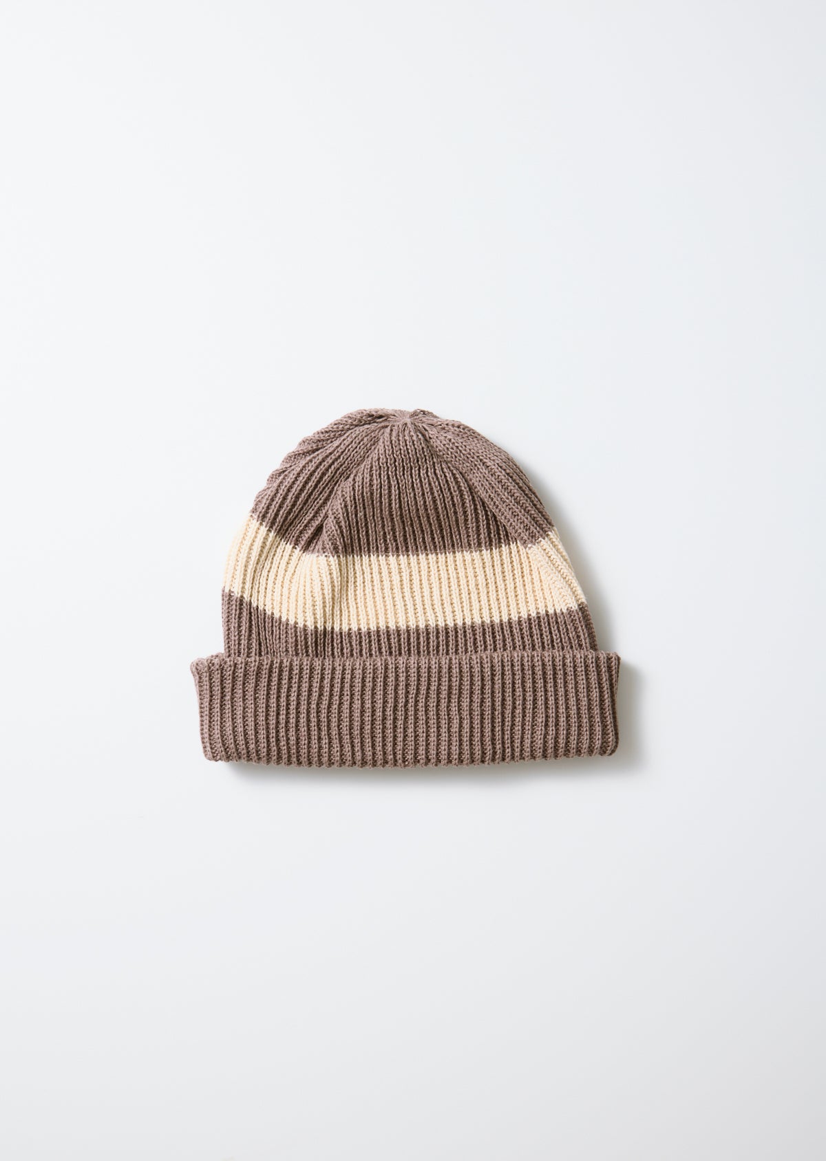 Cotton flax stripe beanie in mocha with a cream horizontal stripe and ribbed knit texture.