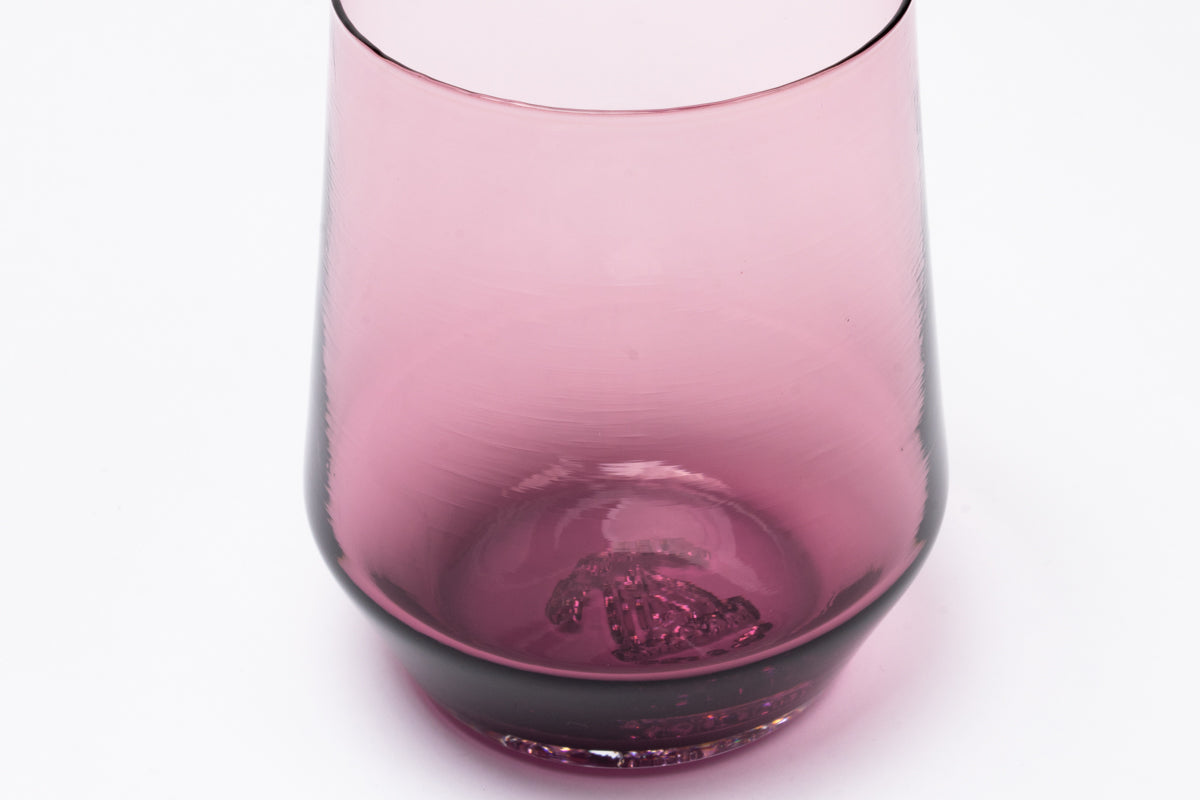 Purple glass wine glass by BG, featuring textured bubbles embedded in the thick base.
