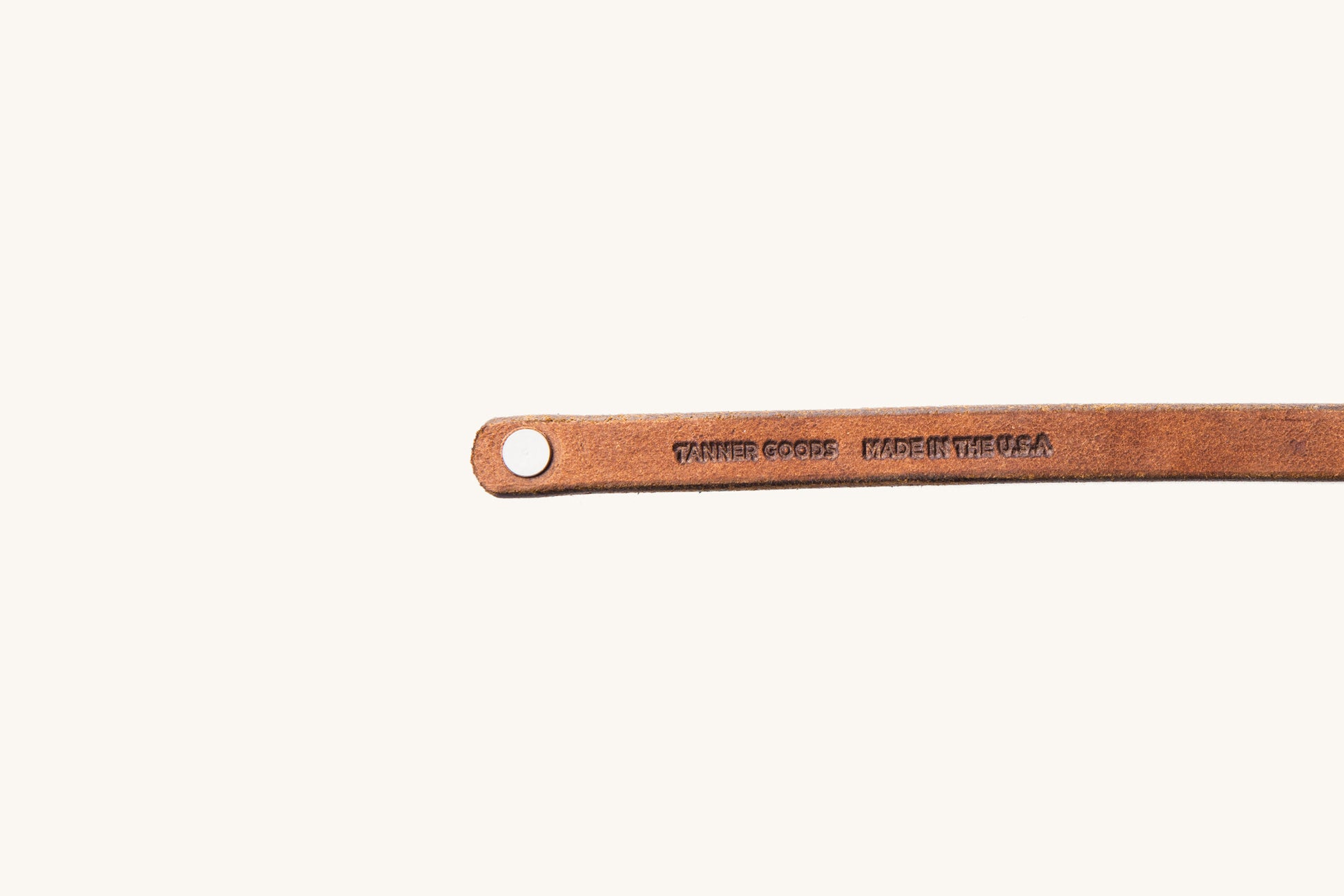 Tanner Goods and Made in the USA monograms on underside of leather wristband.