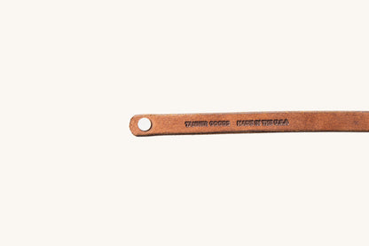 Tanner Goods and Made in the USA monograms on underside of leather wristband.