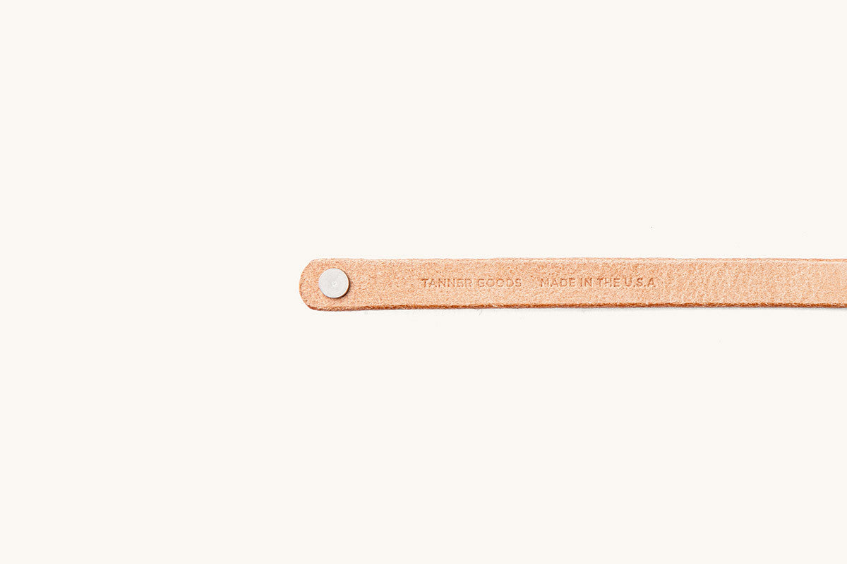 Tanner Goods and Made in the USA monograms on underside of leather wristband.